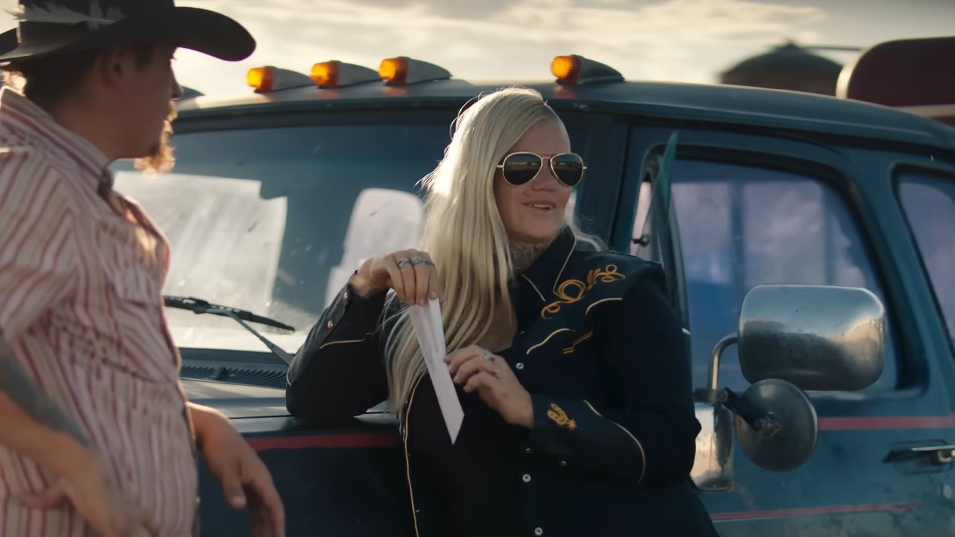 Tabatha Zimiga in conversation during a ranch scene from East of Wall, highlighting the film&rsquo;s blend of real experiences and scripted narrative (Image via Sony Pictures)