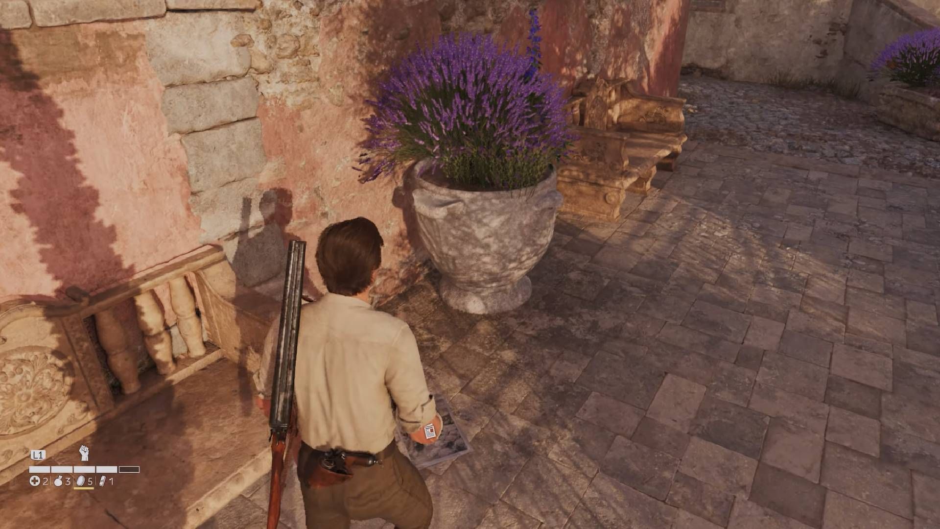 Easter Celebration paper is located in front of a pink house in Mafia The Old Country (Image via 2K || YouTube/@100Guides)
