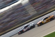 Kyle Busch (8) and Daniel Suarez (99) in the NASCAR Cup Series race at Iowa. Source: Getty