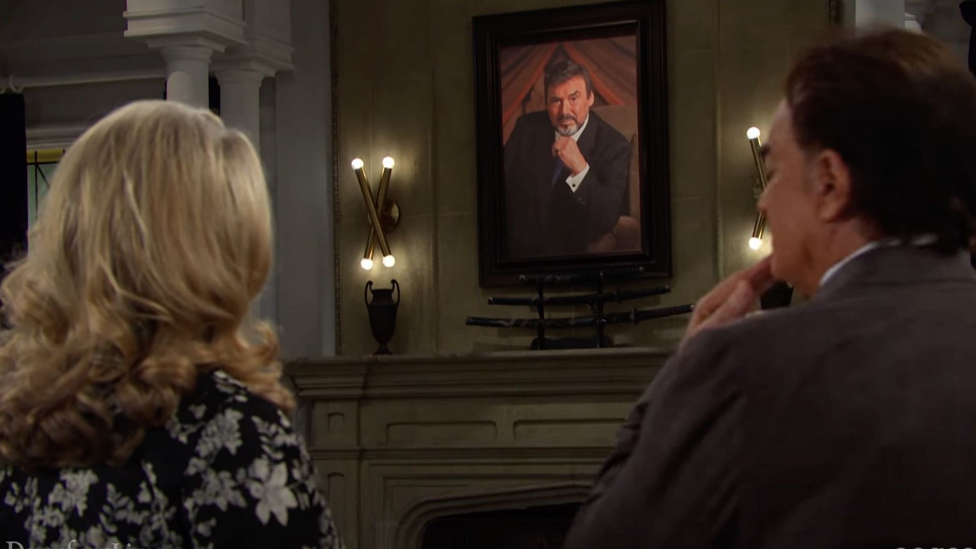 A still of Anna and Tony, looking at Stefano