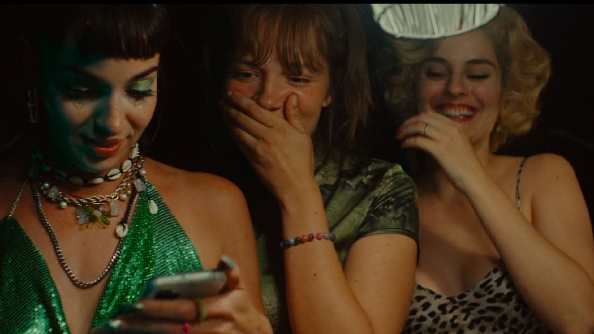 Female friendship and shared laughter anchor The Balconettes even amid chaos (Image via The Forge)