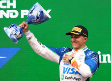 Watch: Isack Hadjar running to his team and jumping the barricade as he secures his first ever F1 podium at the Dutch GP
