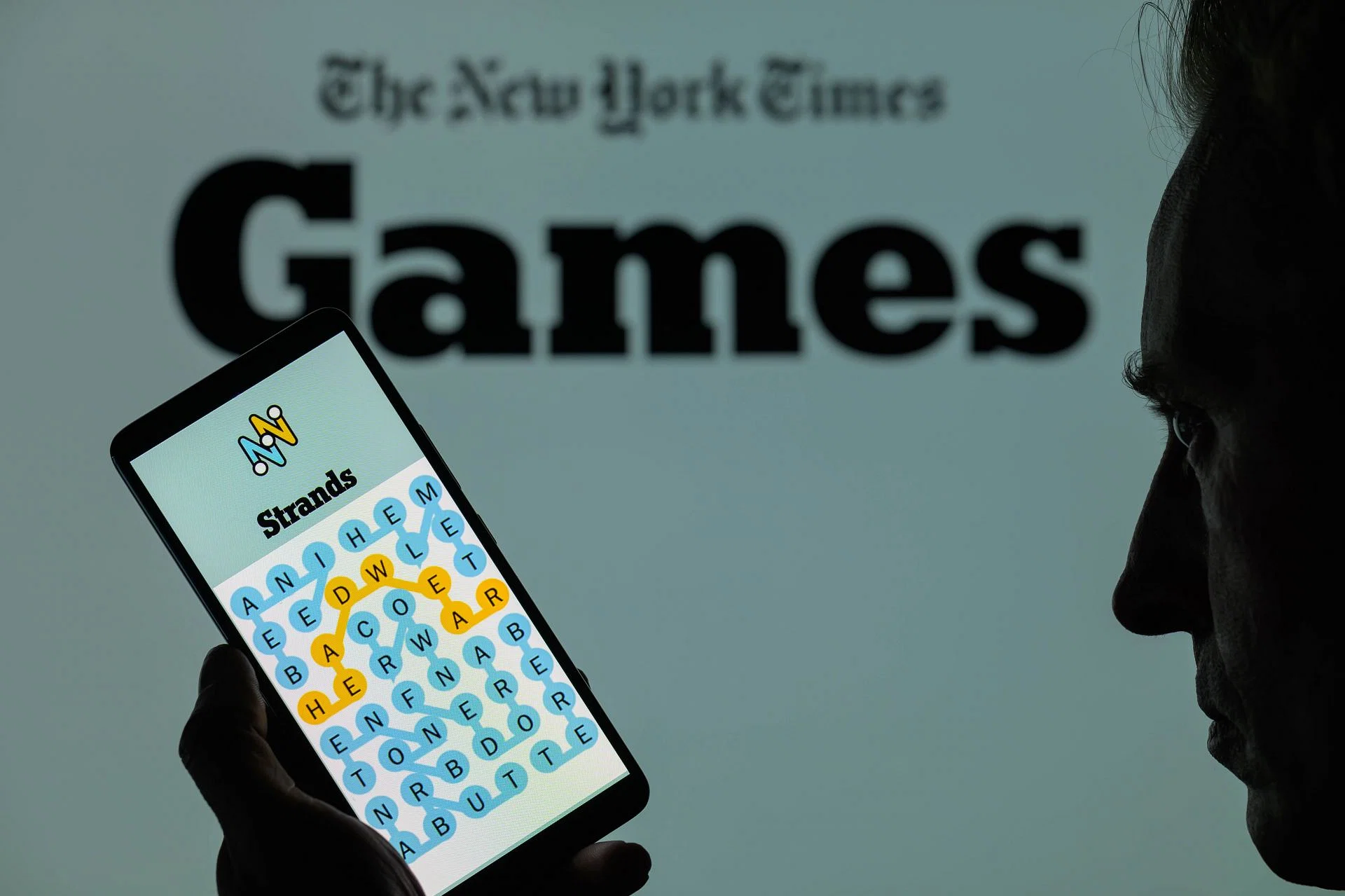 NYT Strands Game - Photo Illustration - Source: Getty