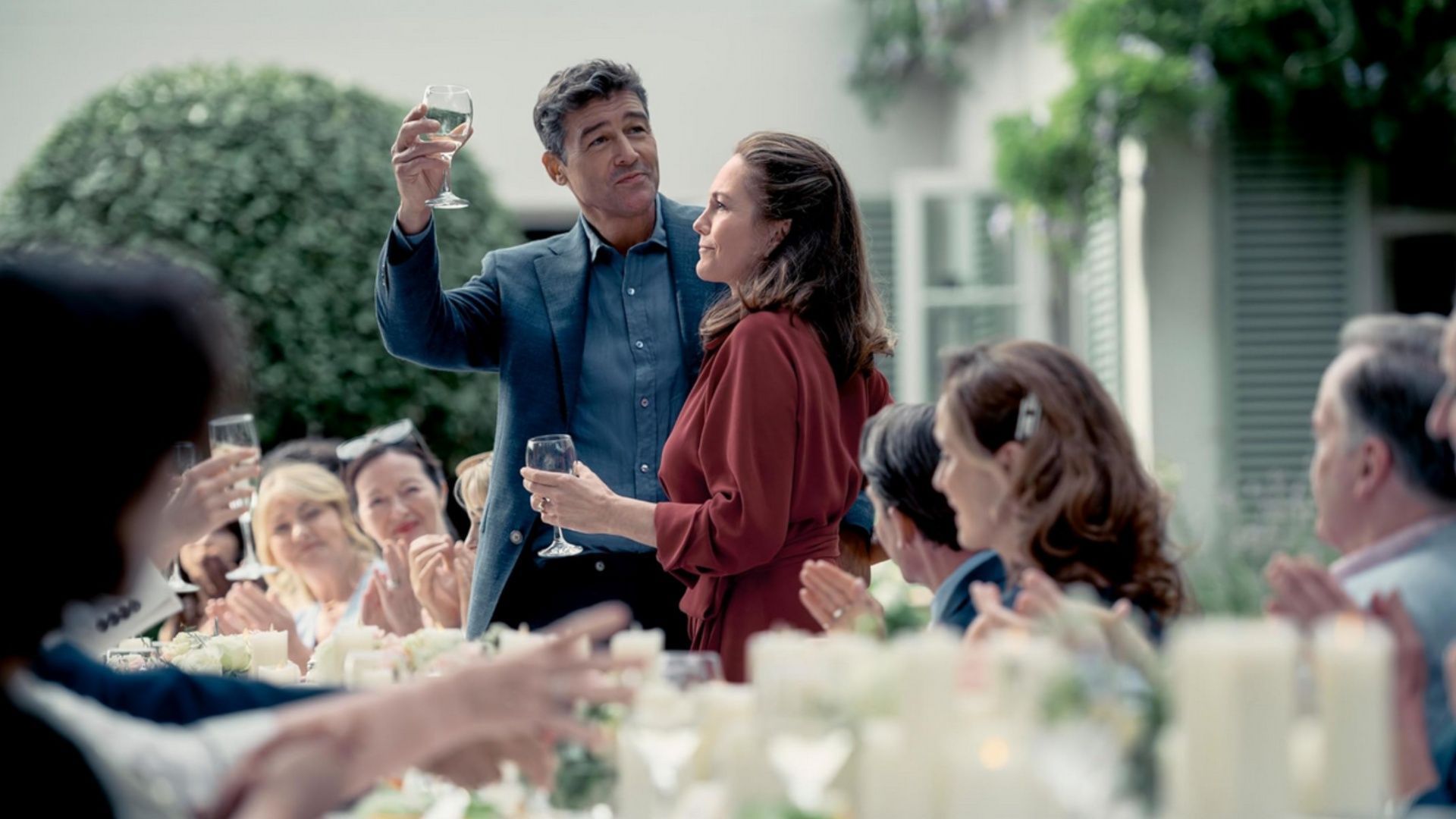 A still from the trailer showing Ellen and Paul celebrating their anniversary. (Image via Lionsgate)