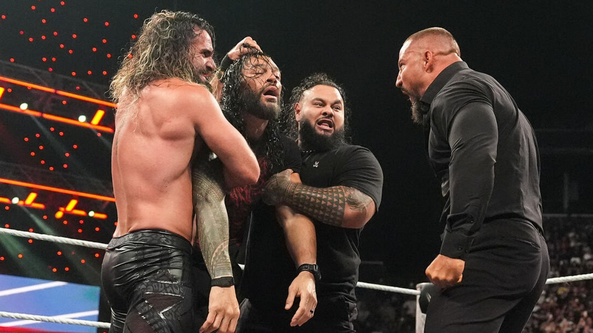 The Vision destroys Roman Reigns on RAW! [Image from WWE.com]