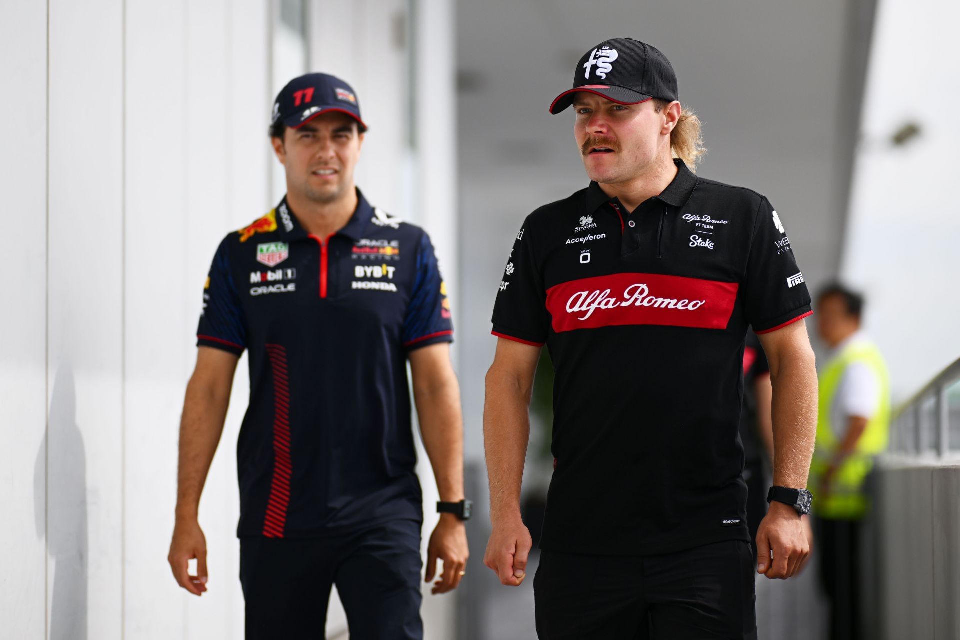 Sergio Perez of Mexico and Oracle Red Bull Racing and Valtteri Bottas of Finland and Alfa Romeo  - Source: Getty