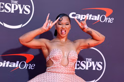 Jordan Chiles poses in cut-out animal print dress in bold photoshoot