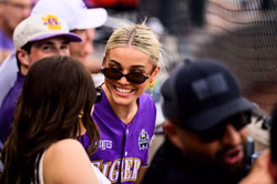 Olivia Dunne poses in black swimwear during pool day outing with wives of Pittsburgh Pirates players