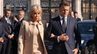 French President Emmanuel Macron and Brigitte Macron arrive to attend a ceremony at the statue of wartime (Image via Getty)