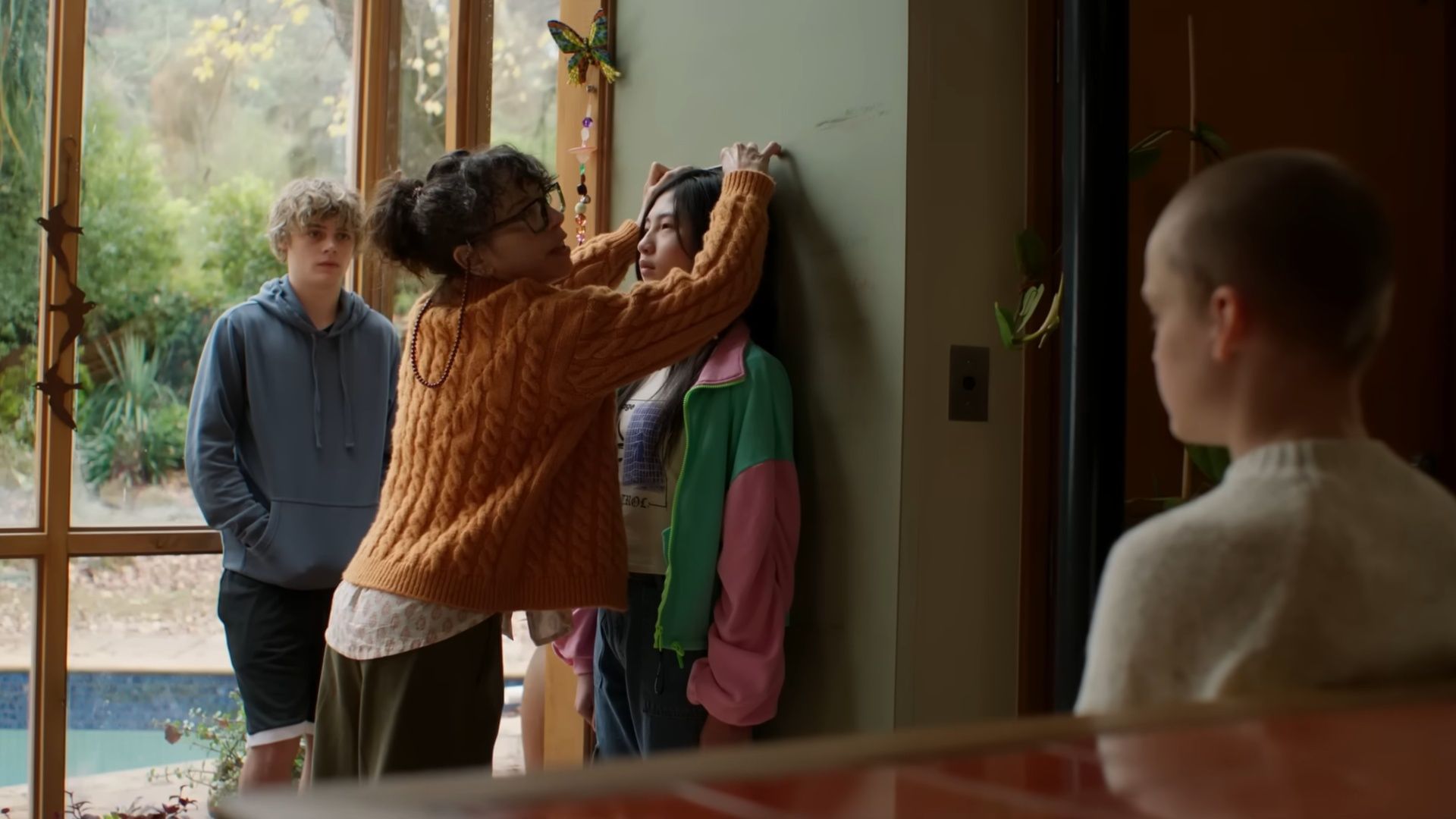 In Bring Her Back, Laura measures Piper&#039;s height inside the house, a tense moment foreshadowing her sinister intentions. (Image via A24)