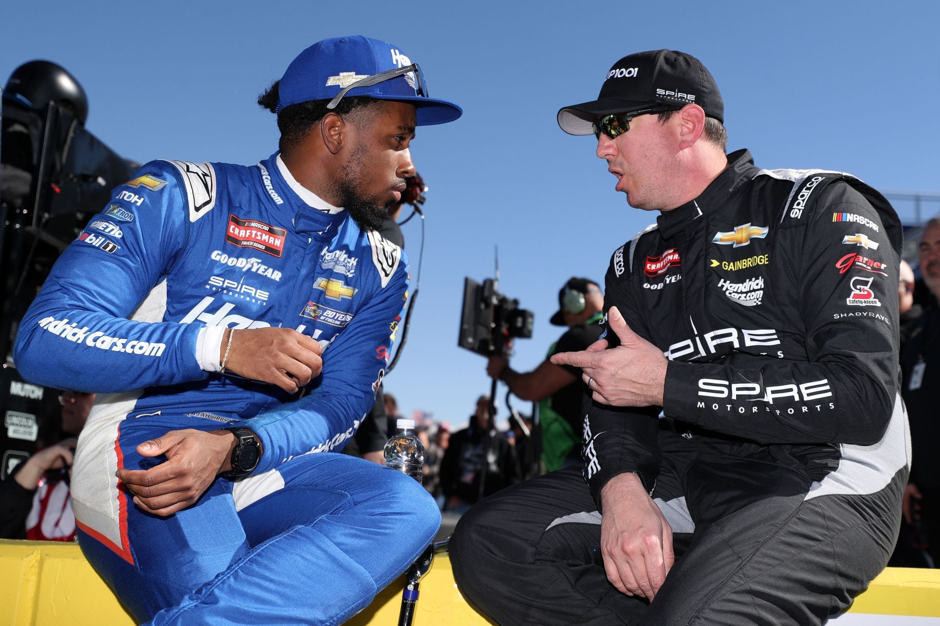 Rajah Caruth (L) and Kyle Busch before the NASCAR Craftsman Truck Series race. Source: Getty