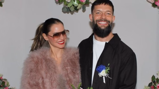 Celebrations for Finn Balor and his wife Vero Rodriguez!