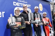 Colton Herta, Dan Towriss, Kyle Kirkwood, and Santino Ferrucci on the IndyCar Chevrolet Detroit Grand Prix podium - Source: Getty