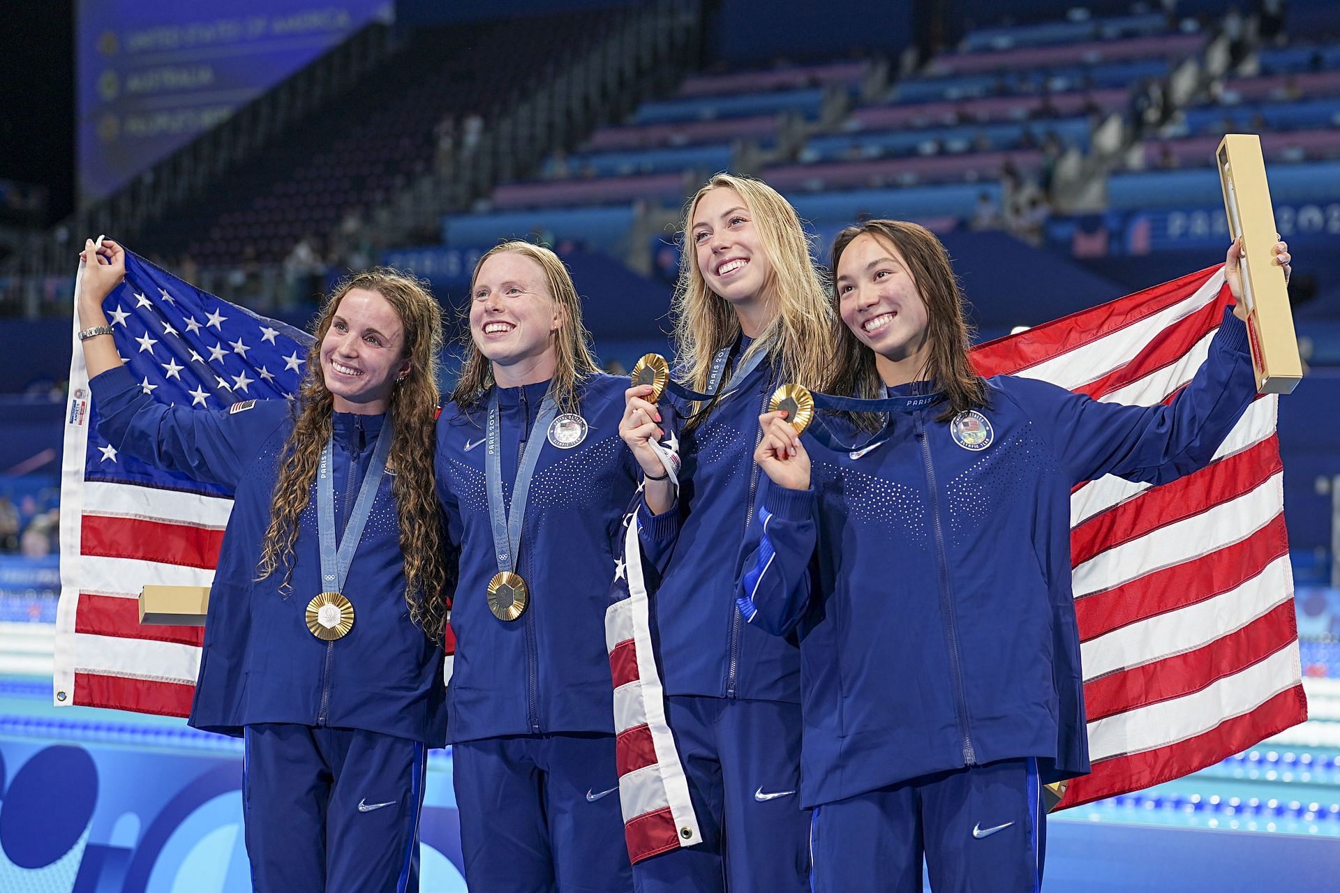 Smith (L) with the U.S Relay team at Paris - Source: Getty