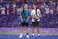 Alejandro Davidovich Fokina (left) and Alex de Minaur (right) pose with the men's singles runner-up and winner's trophies respectively at the 2025 Mubadala Citi DC Open (Source: Getty)