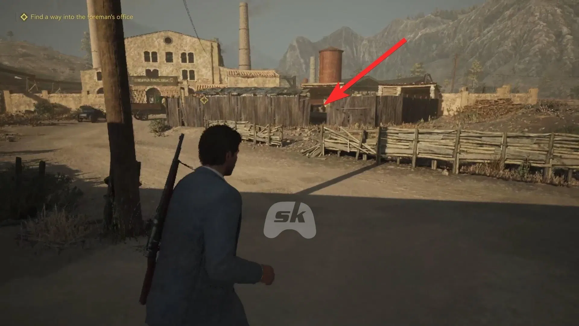 Enter the factory through the gap on the fence (Image via Sportskeeda Gaming || 2K)