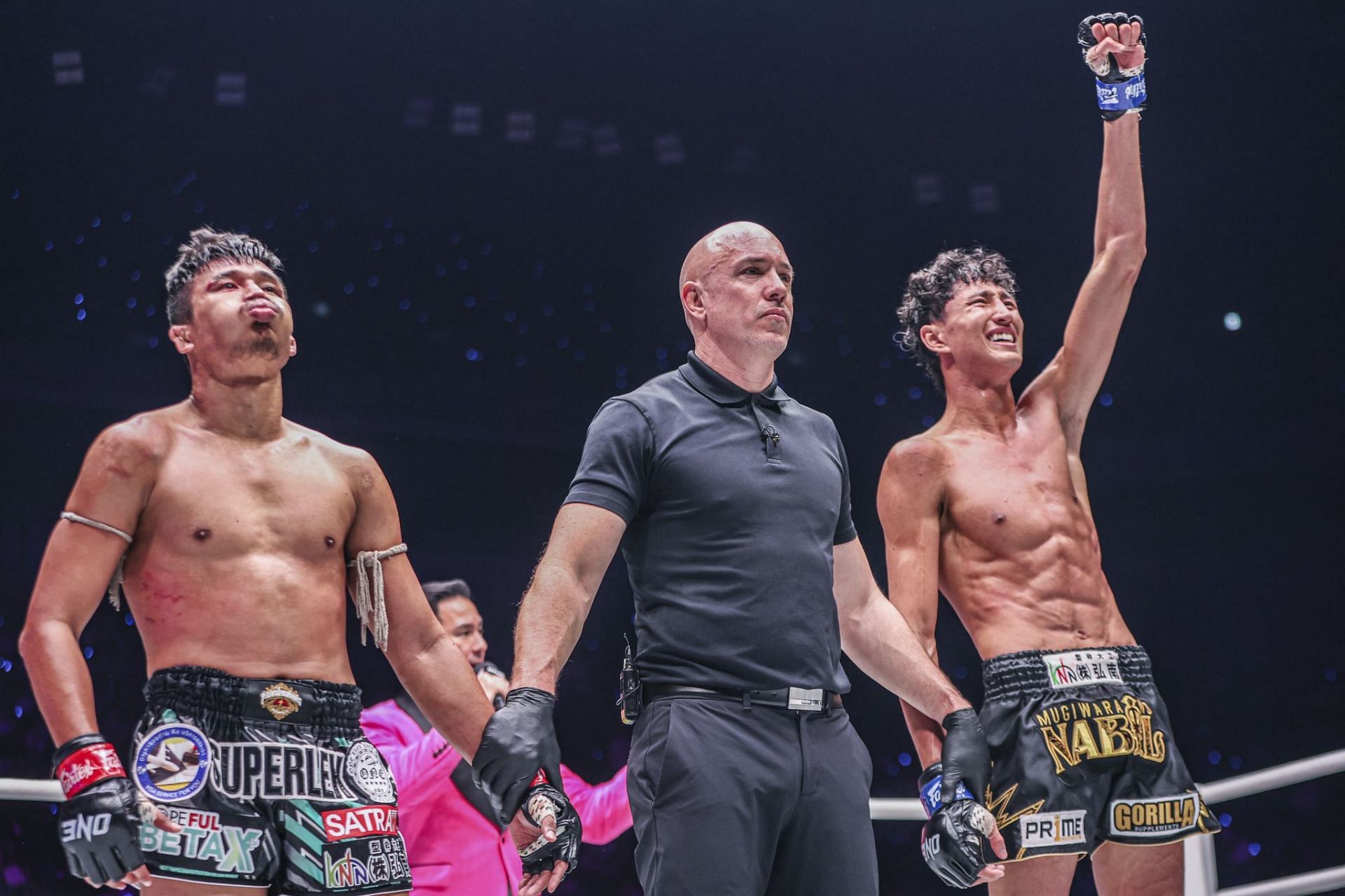 Nabil Anane (right) gets his hand raised after his rematch against Superlek at ONE 172. [Image courtesy from ONE Championship]