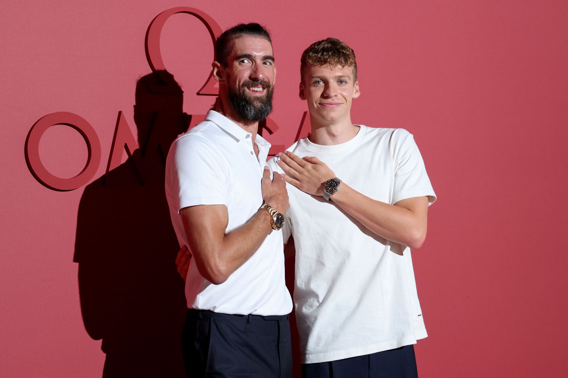 Michael Phelps and Marchand at the OMEGA House Paris 2024 - Day 10 - (Source: Getty)