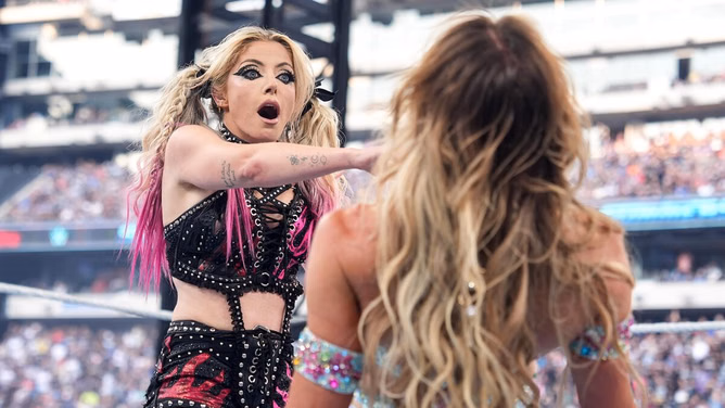 Charlotte Flair responds after unseen video shows her holding both Women's Tag Team Title belts on SmackDown