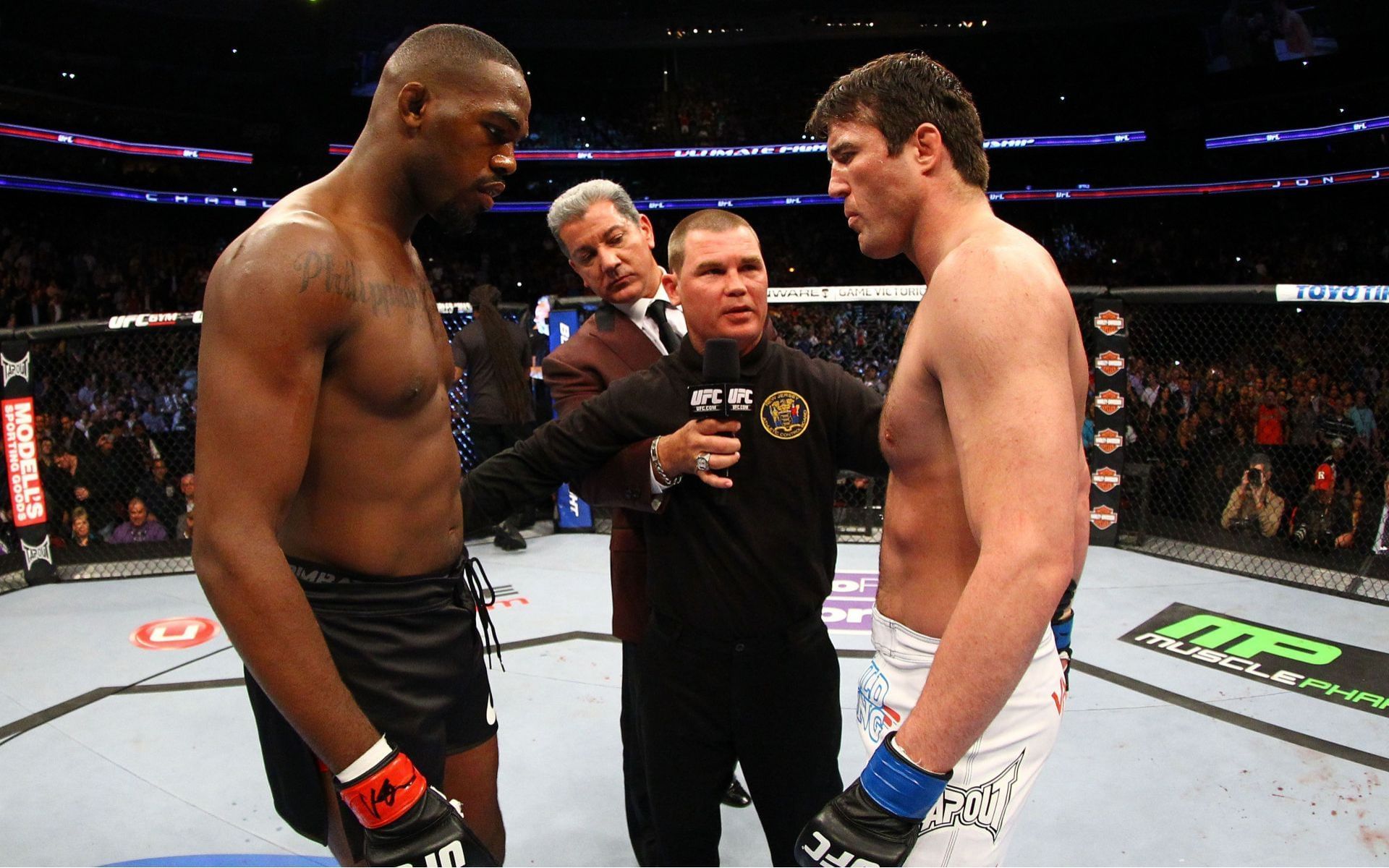 Chael Sonnen (right) aims dig at former opponent Jon Jones (left). [Images courtesy: Getty Images]