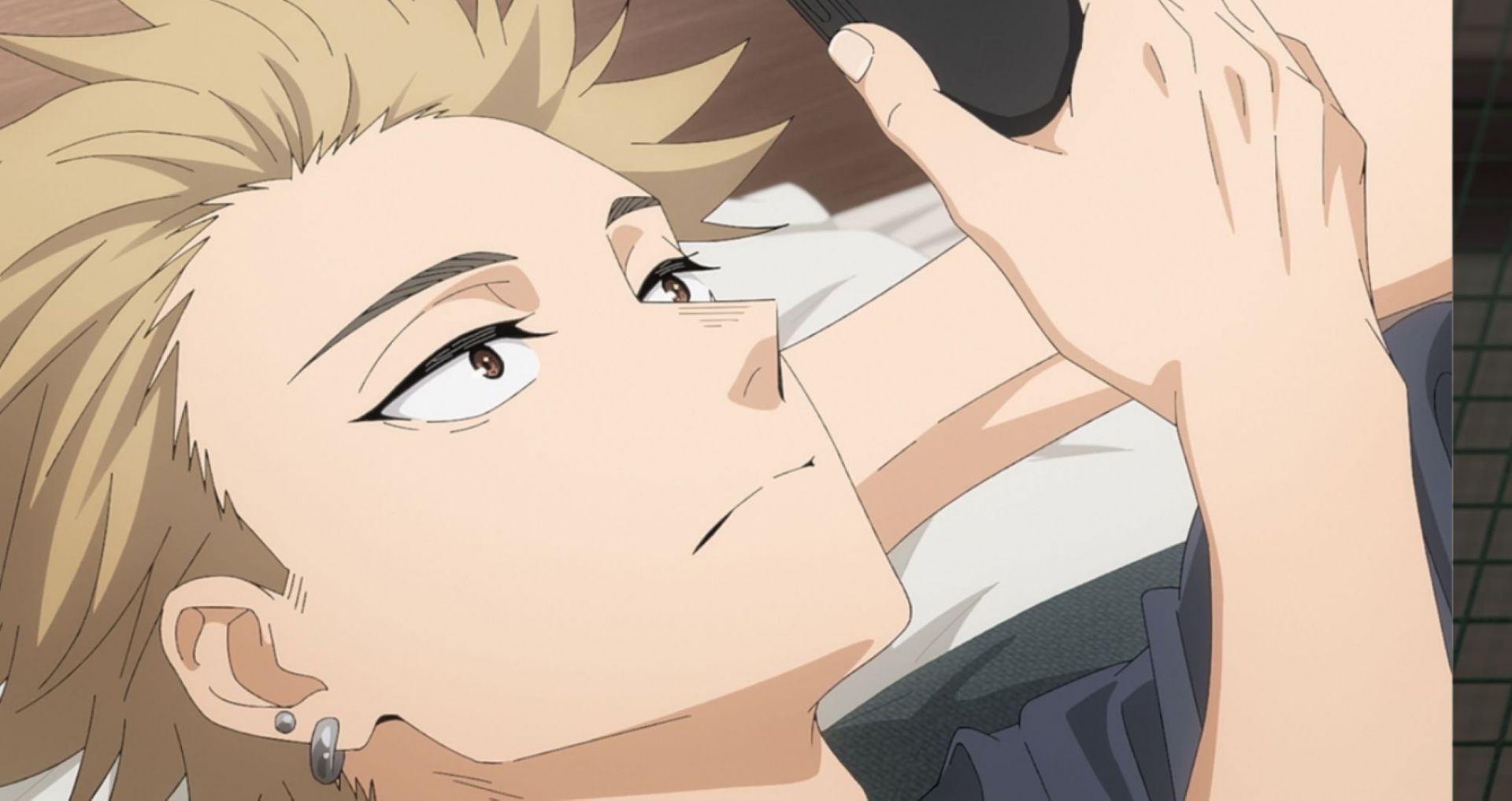 Rintaro checks his phone (Image via CloverWorks)