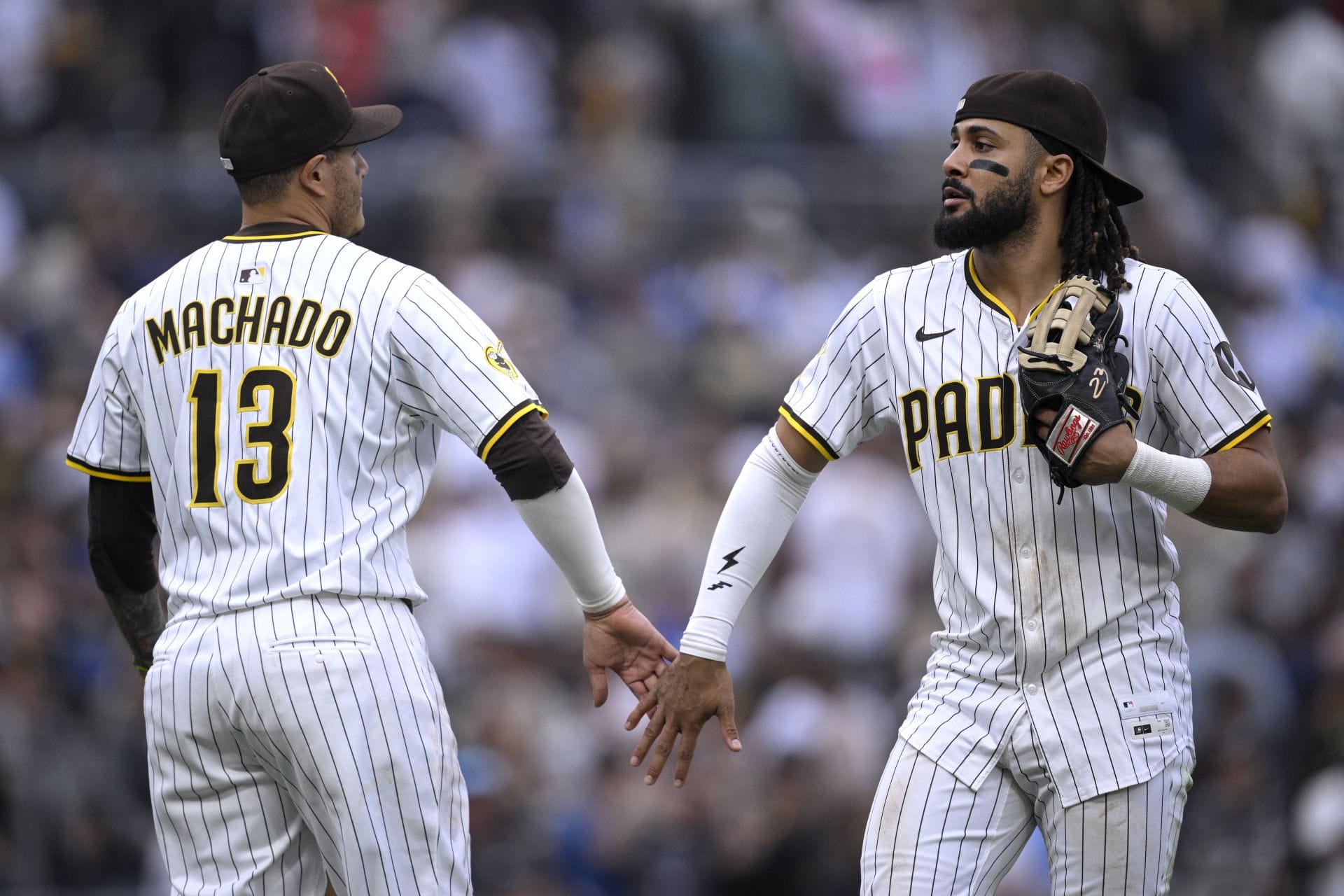 Manny Machado (L), Fernando Tatis Jr. (R) - Source: Getty