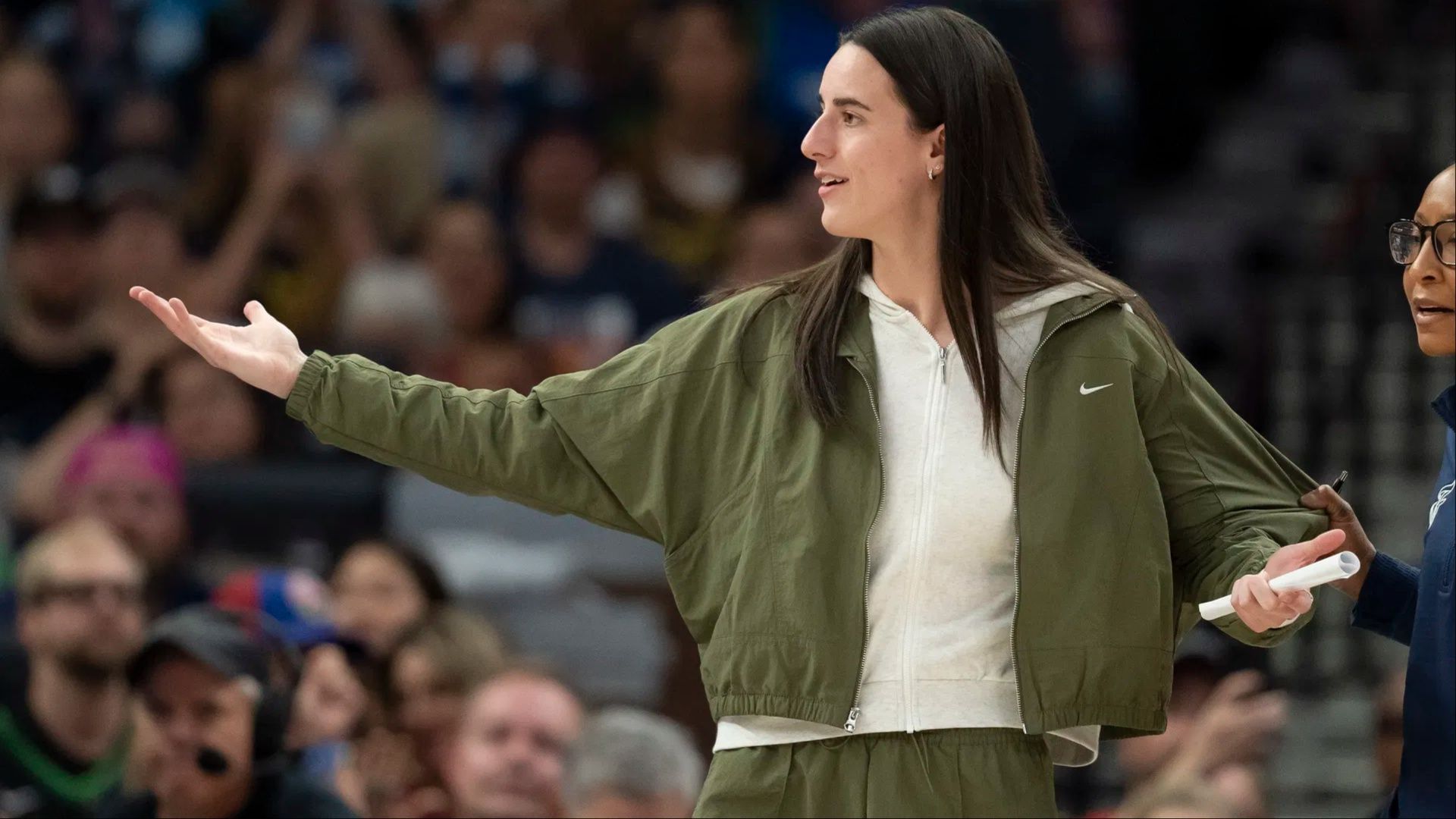 Caitlin Clark hilariously advises young Lynx fans to support Fever in courtside interaction. (Photo: IMAGN)
