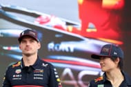 Red Bull's Max Verstappen (L) and Yuki Tsunoda (R) at the 2025 F1 Grand Prix of Hungary race weekend - Source: Getty