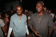 Kanye West and Pusha T at the MNIMN listening event at Industria Superstudio in 2013 (Image via WireImage/Getty)