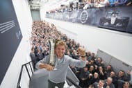 Nico Rosberg of Germany and Mercedes GP celebrates winning the F1 World Drivers Championship with Mercedes GP staff on December 1, 2016 in Brackley, England. - Source: Getty Images