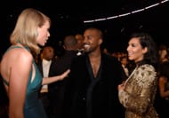 Taylor Swift, Kanye West, and Kim Kardashian West attend The 57th Annual GRAMMY Awards in 2015. (Image via Getty)