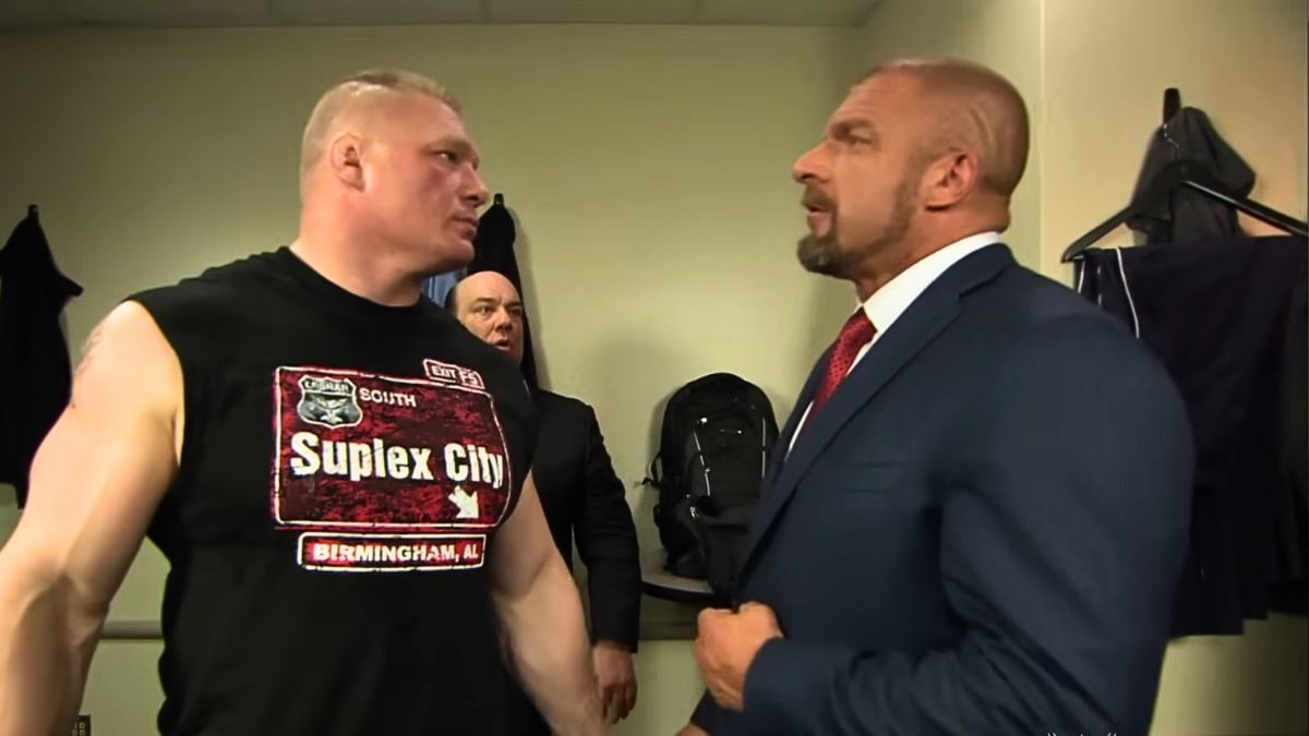 Brock Lesnar, Paul Heyman, and Triple H. [Image via WWE on YouTube]