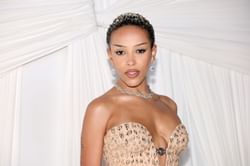 Did Doja Cat unveil the album cover for "Vie"? Rapper says her rose-filled vinyl cover is not the album cover