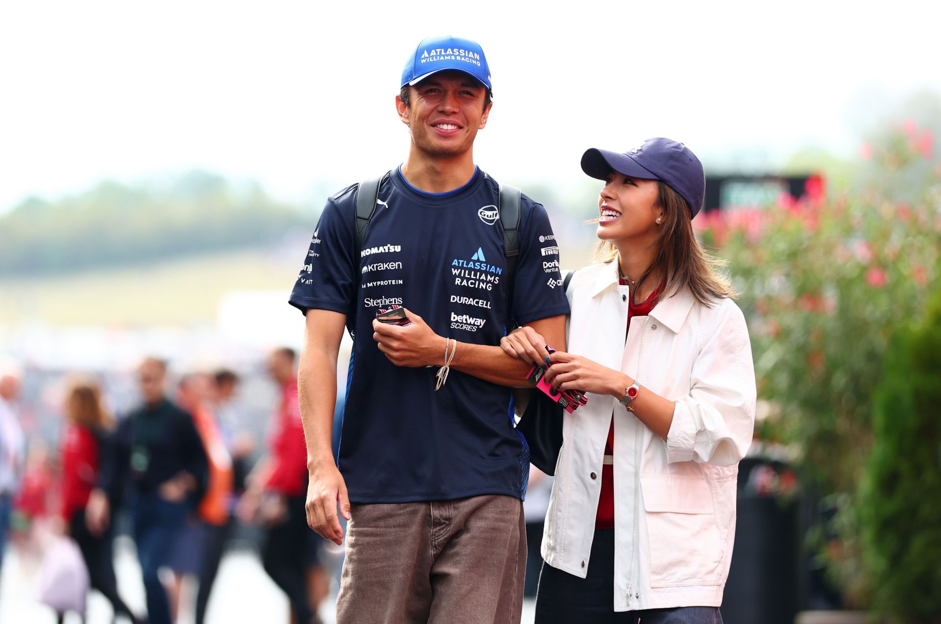 Williams&#039; Alex Albon (L) and LPGA golfer Lily Muni He (R) at the 2025 F1 Grand Prix of Hungary - Source: Getty