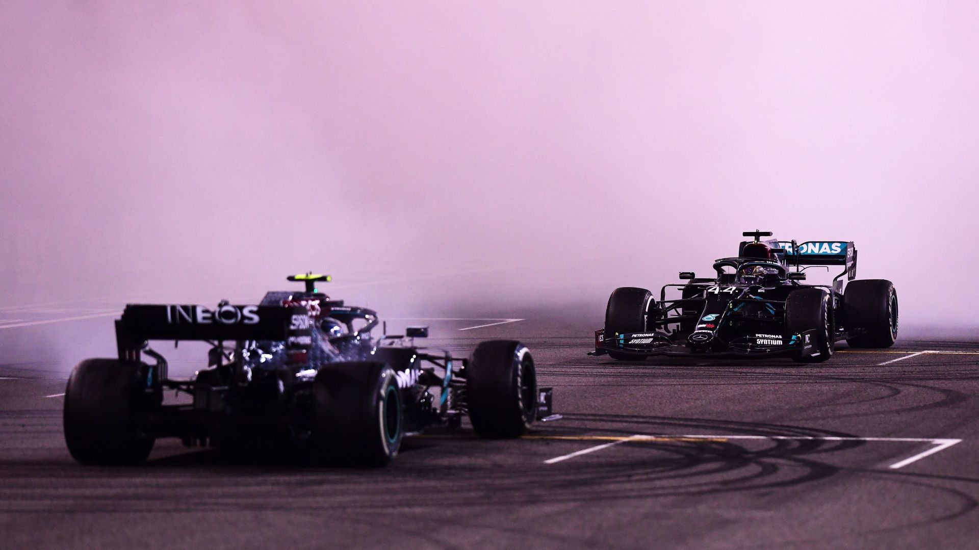 Valtteri Bottas and Lewis Hamilton perform donuts after the F1 Abu Dhabi Grand Prix. Source: Getty