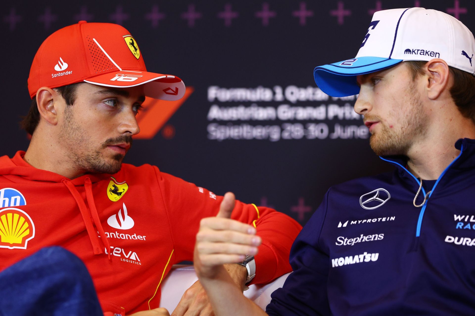 Charles Leclerc and Logan Sargeant at a press conference in Spielberg. Source: Getty