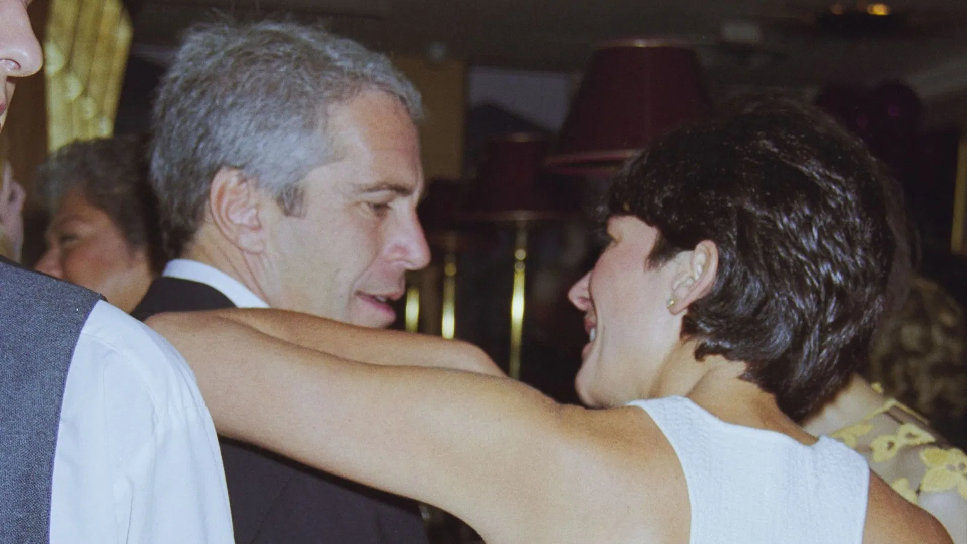 Jeffrey Epstein and Ghislaine Maxwell at a party in honor of David Tang (Image via Getty)