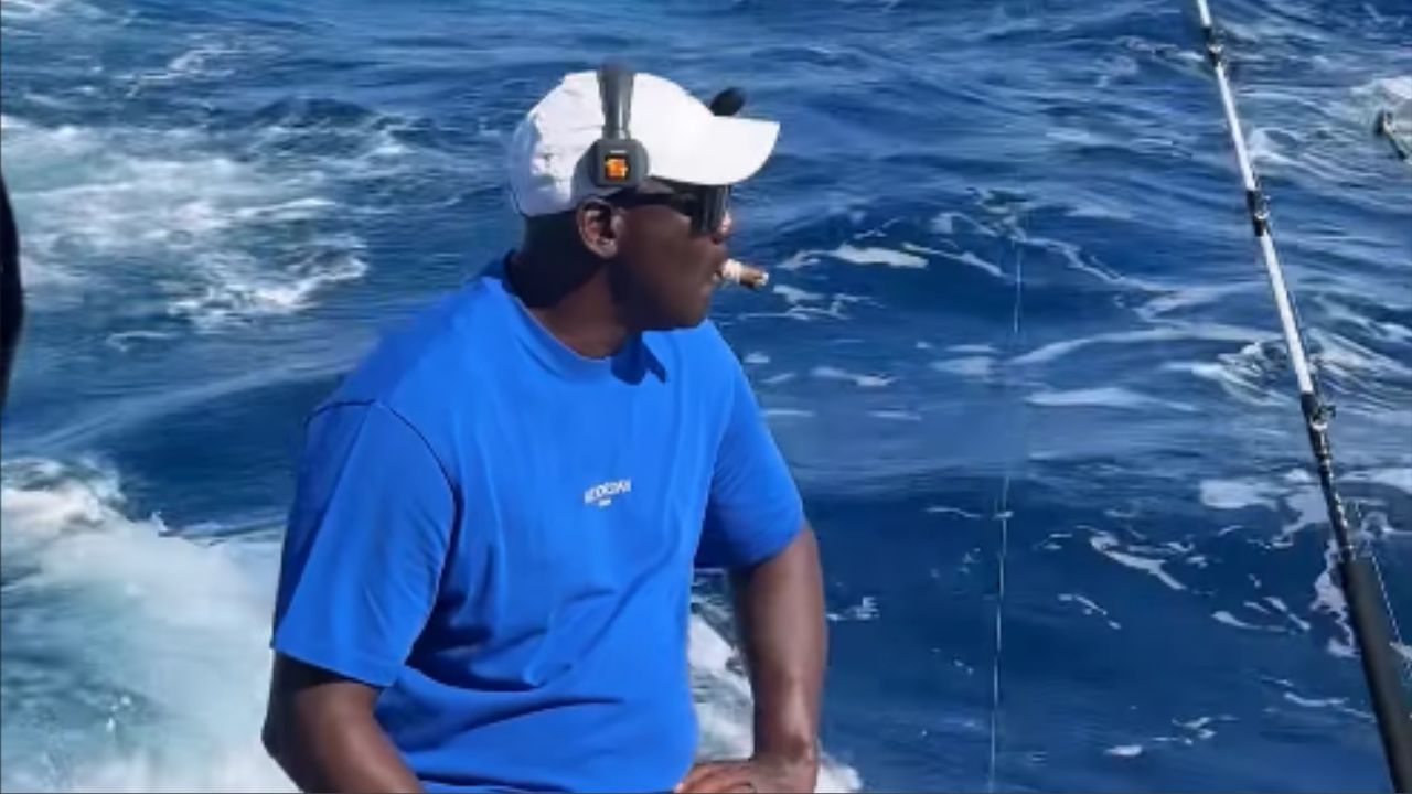 Michael Jordan enjoys cigars as he relaxes on board yacht
