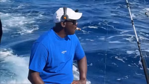 Michael Jordan enjoys cigars as he relaxes on board yacht after pocketing $400K in prestigious competition