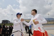 David Malukas shakes hands with Will Power at the IndyCar Iowa Race Weekend - Source: Getty