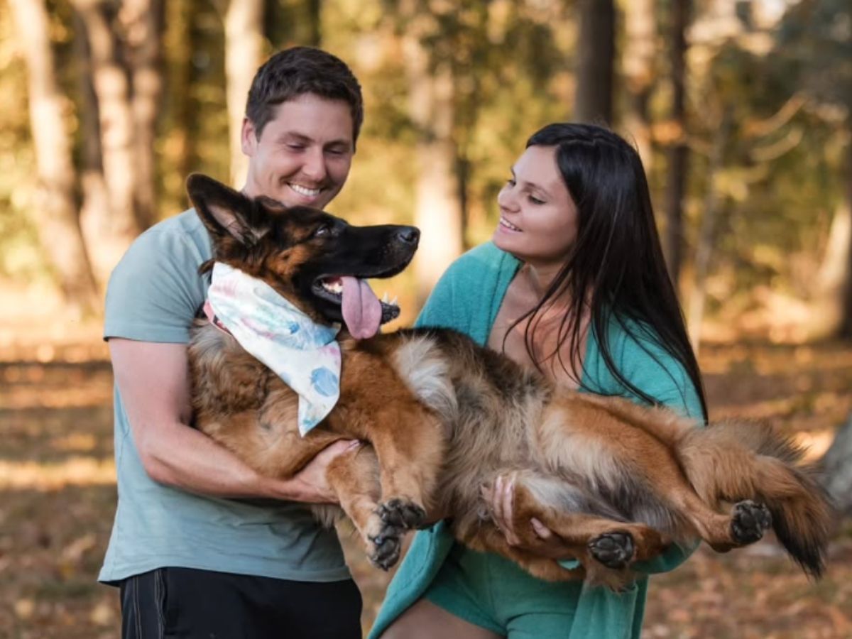 Brandon and Julia with their pet dog, Nalla (Image via Instagram/@juliatrubkina1993)