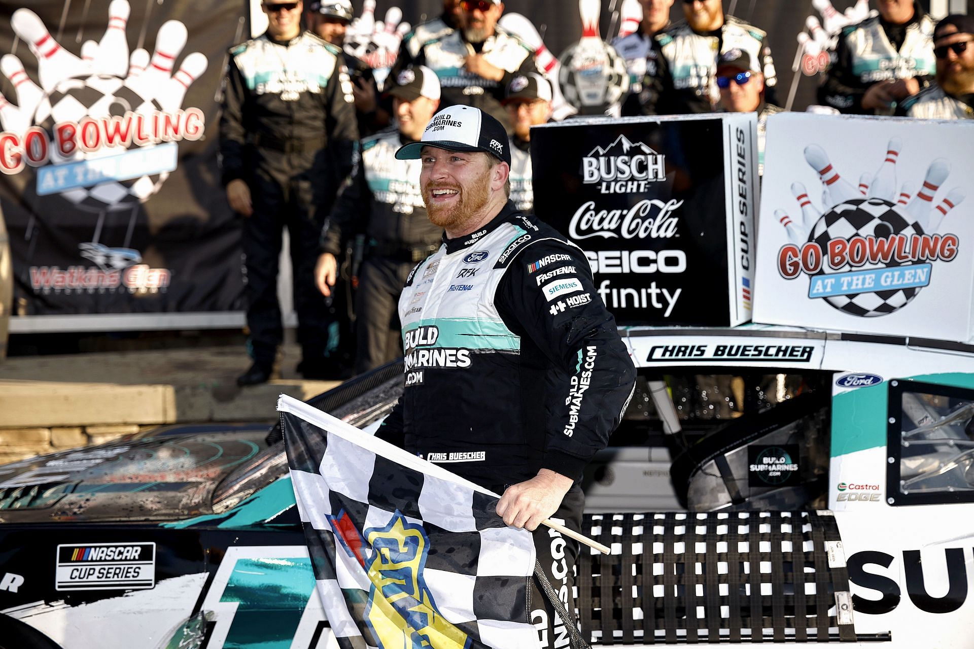 RFK Racing&#039;s Chris Buescher celebrates after winning the 2024 Go Bowling at The Glen. Source: Getty