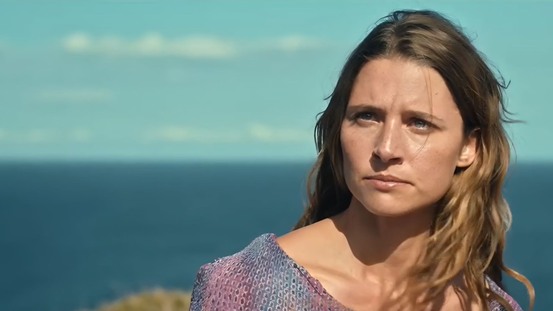 Lilli&rsquo;s determined stare at the cliffs mirrors the unresolved fate of the villains in Fall For Me. (Image via Netflix)