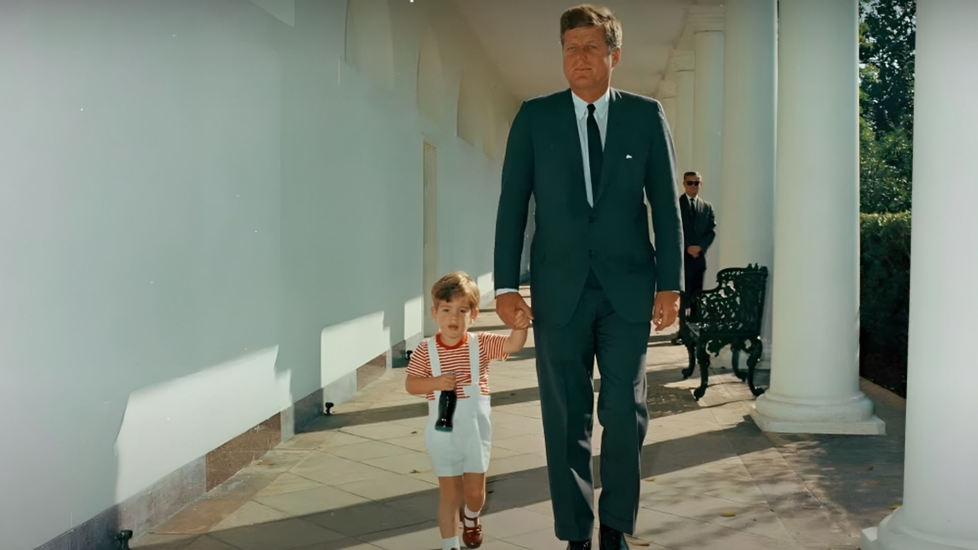 An image of young John F. Kennedy Jr. with his father (Image via CNN)