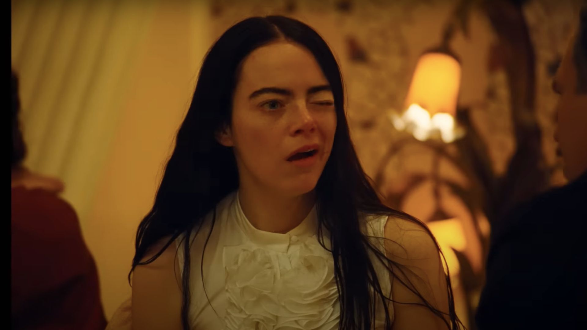 Stone as Bella (Image via YouTube/ SearchlightPictures)