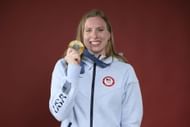 Lily King poses with her Olympic gold medal - Source: Getty