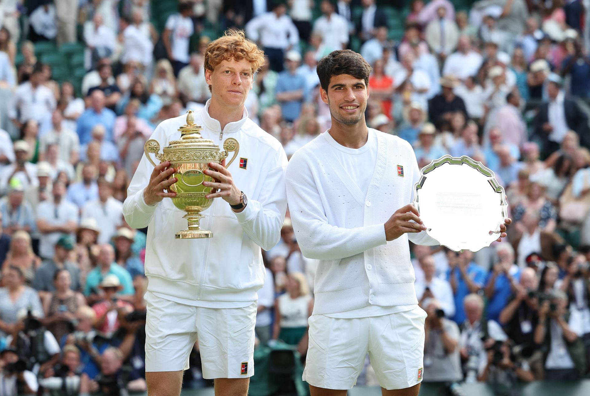 Jannik Sinner (left) and Carlos Alcaraz (right) after the conclusion of the men&#039;s singles final at the 2025 Wimbledon Championships (Source: Getty)