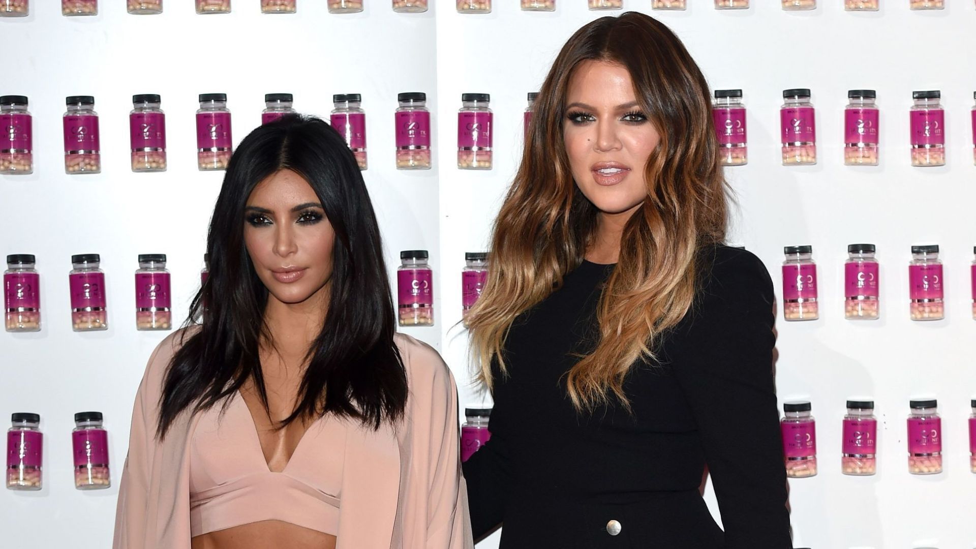 From L to R: Kim Kardashian and Khloe Kardashian (Image via Getty Images)