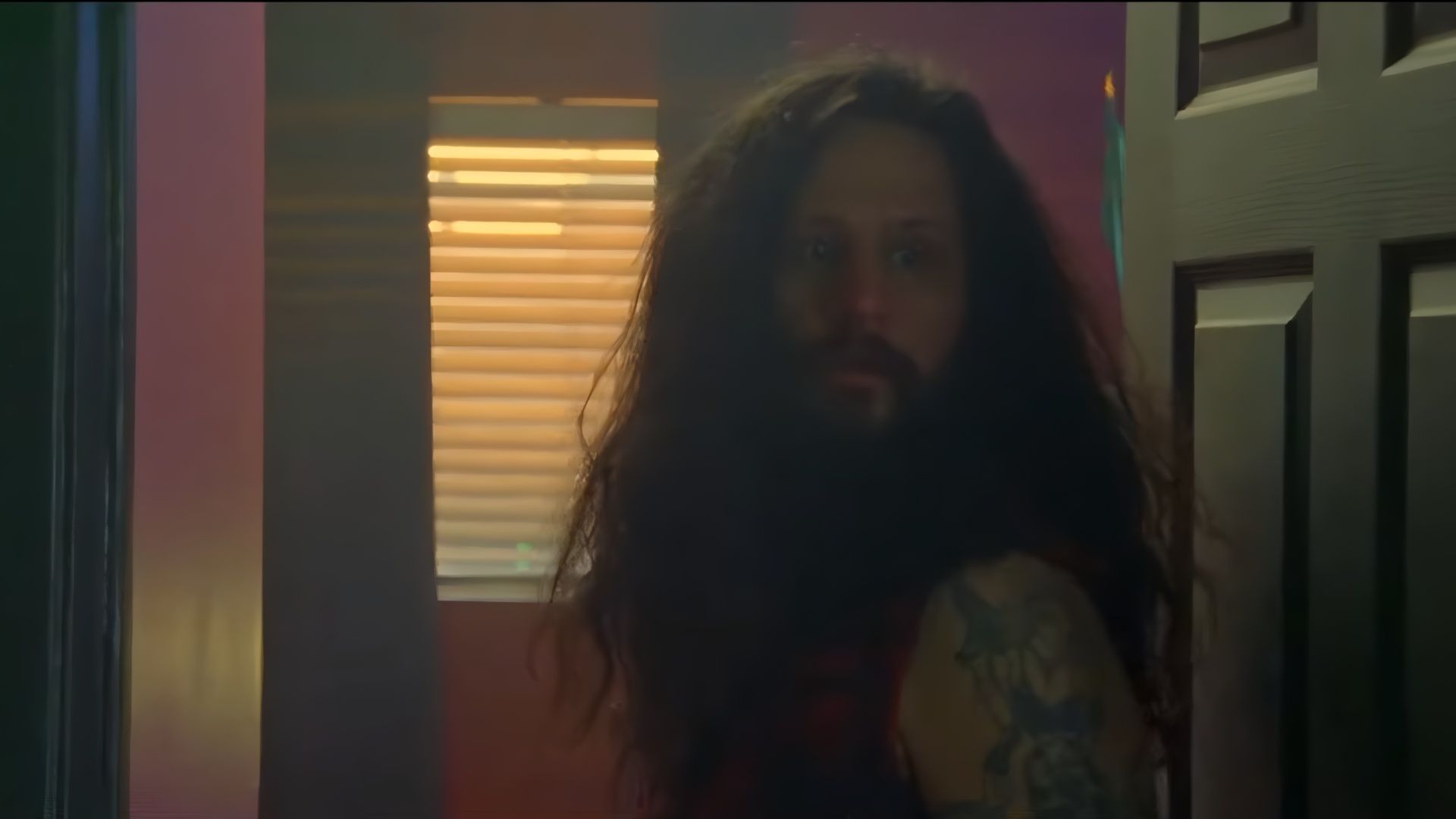 Jimmy caught between paranoia and reality. (Image via YouTube/The Horror Section)