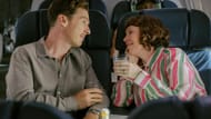 The Roses captures a tender yet ironic moment as Ivy and Theo share drinks mid-flight. (Image via YouTube/Searchlight Pictures)
